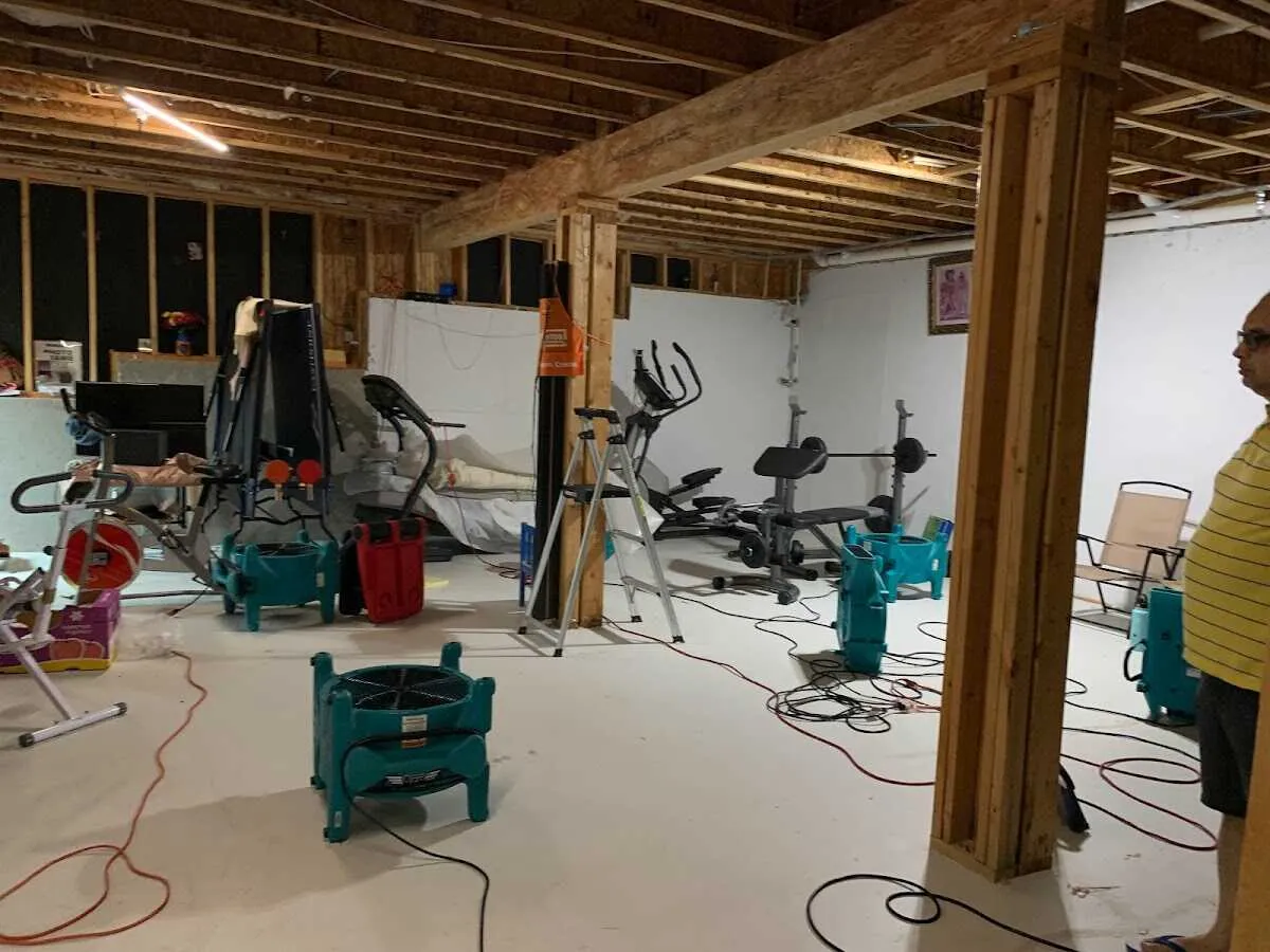 Basement drying equipment setup for Contents Cleaning & Restoration in Perinton