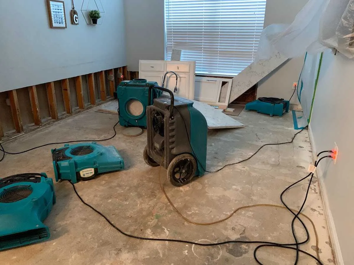 Dehumidifier in flood-cut room for Water Damage Restoration in Perinton